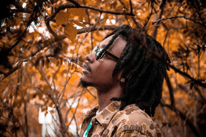 plant, portrait, land, 5K, outdoors, nature, clothing, orange, adult, fashion, plant part, young men, one person, trees, braid, change, tree, looking