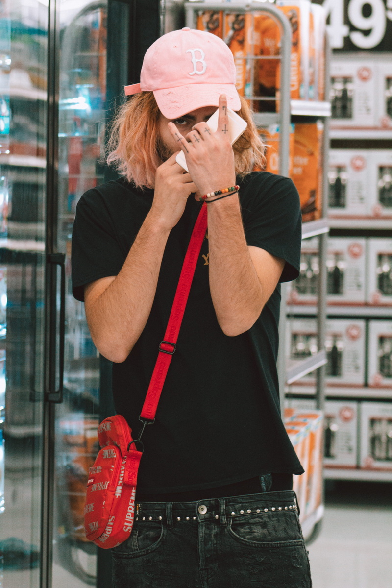 fashion, rhode island, grunge, obscured face, new england, men, standing, trap, communication, holding, singing, one person, indoors, clothing, technology