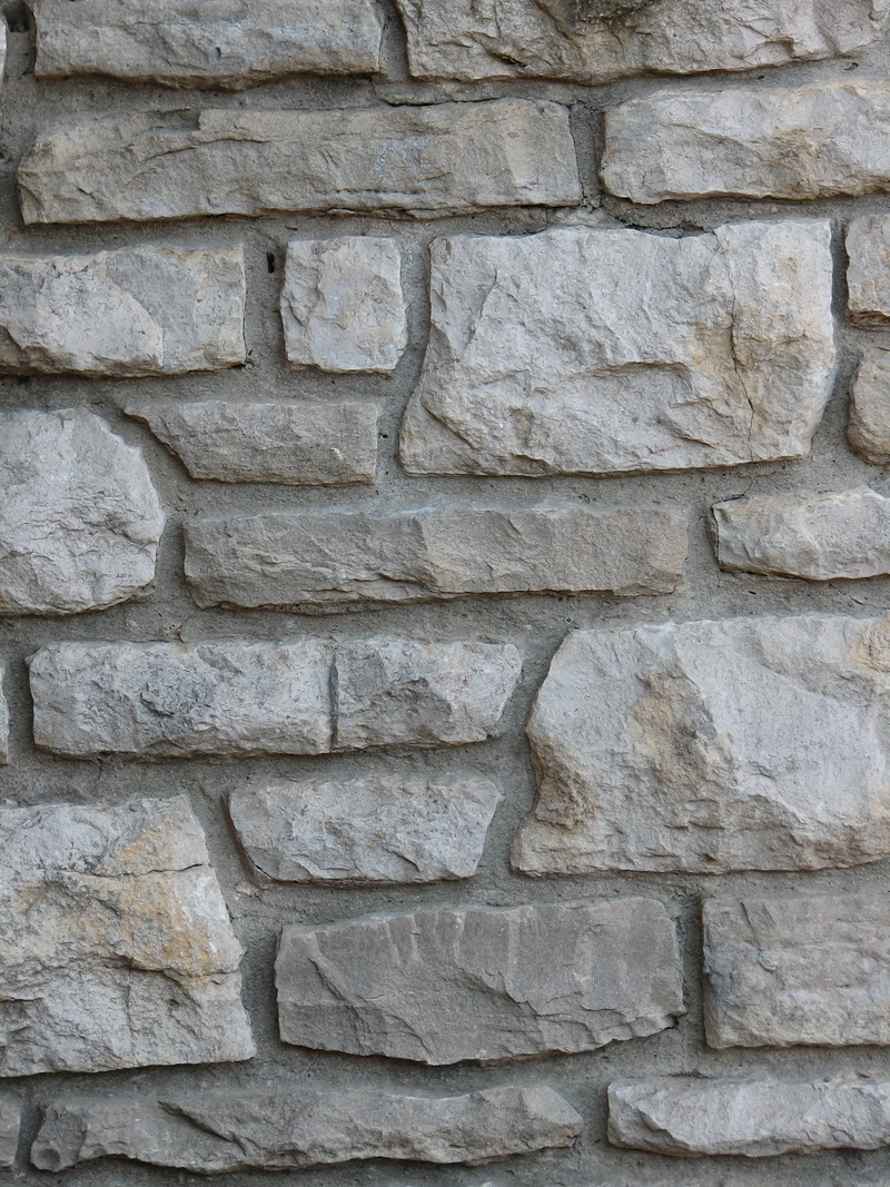 wall - building feature, wall, architecture, rough, exterior, stone material, brick, texture, urban, outdoors, stone-work, design, house, day, no people