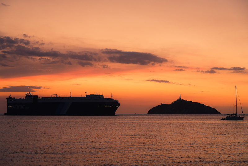 passenger craft, sunset, nautical vessel, lighthouse, cruise ship, dusk, sailboat, ship, transportation, water, sky, cloud - sky, colombia, silhouette