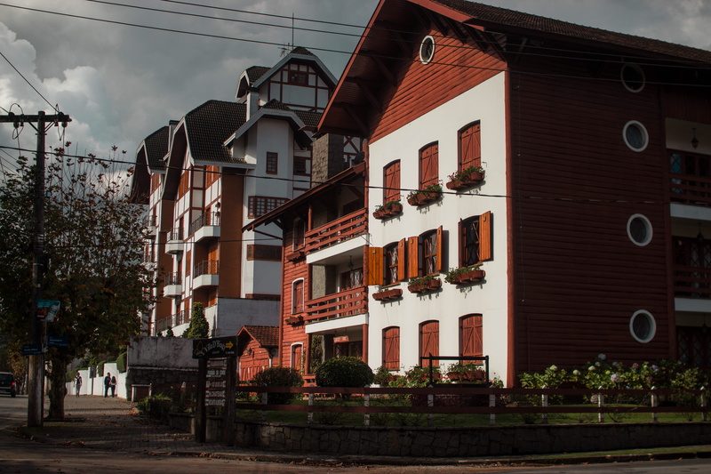switzerland, tree, building exterior, outdoors, campos do jordão, window, architecture, street, cloud - sky, sky, building, row house, houses, day, brazil