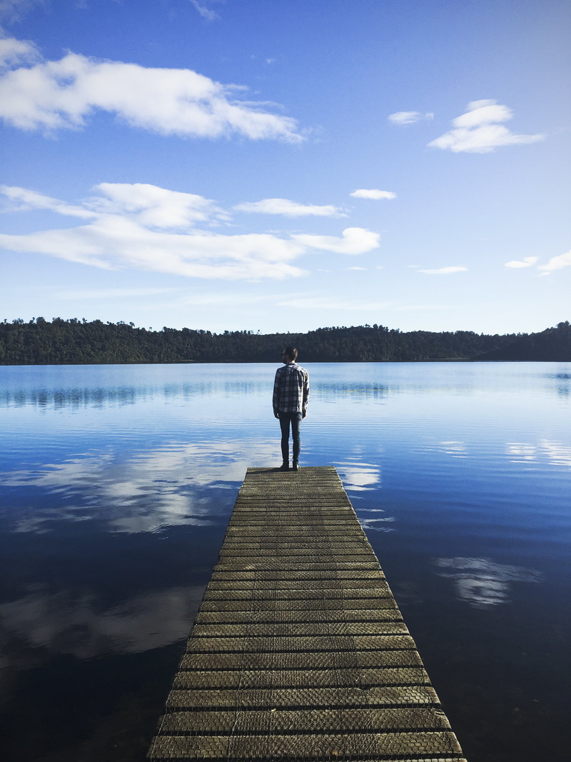 shirt, sky, landscape, pathway, cloud - sky, dock, standing, jetty, clouds, tranquil scene, man, scenics - nature, one person, real people, water, wooden