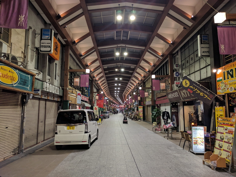 direction, diminishing perspective, footpath, illuminated, indoors, built structure, in a row, nagoya, empty, japan, market, ceiling, city, shop, incidental people