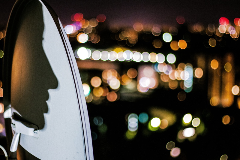 focus on foreground, lighting equipment, defocused, city, car, light - natural phenomenon, decoration, shape, glowing, no people, motor vehicle, bar counter