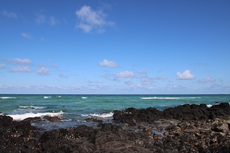 land, wave, horizon, sea, tranquility, blue, nature, 5K, outdoors, jeju island, beauty in nature, solid, horizon over water, rock, cloud - sky, tranquil scene