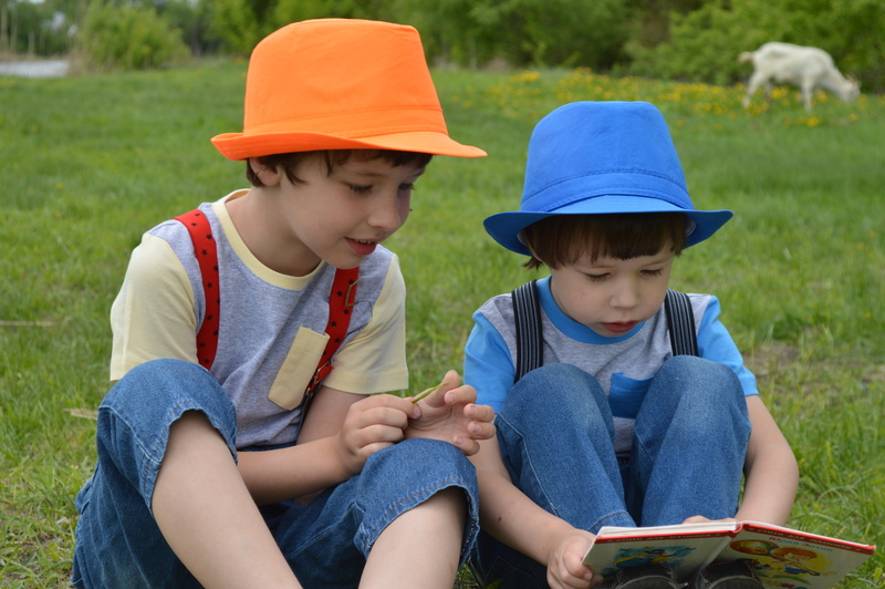 nicely, vacation, blue, two people, read, family, kid, leisure activity, innocence, boy, orange, 2 children, people, men, child, fedora, looking down, boys