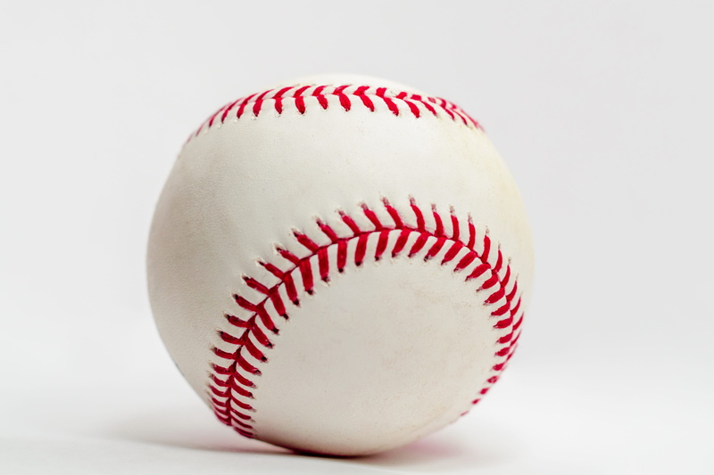 baseball - ball, past time, sphere, pattern, cut out, team, apparel, pearl, indoors, white background, close-up, athlete, sport, copy space, ballplayer