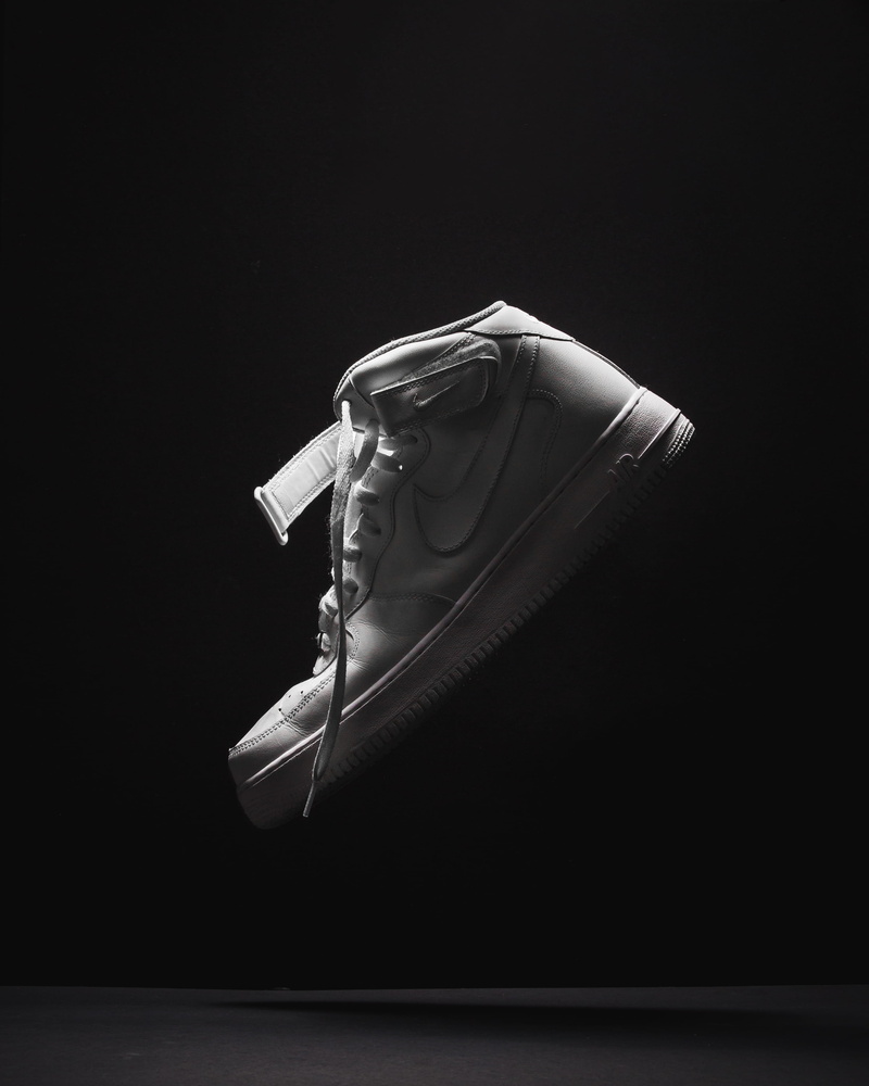shoe, sports, holding, team sport, baseball, photography, security, football, footwear, clothing, apparel, running shoe, studio shot, cut out, close-up