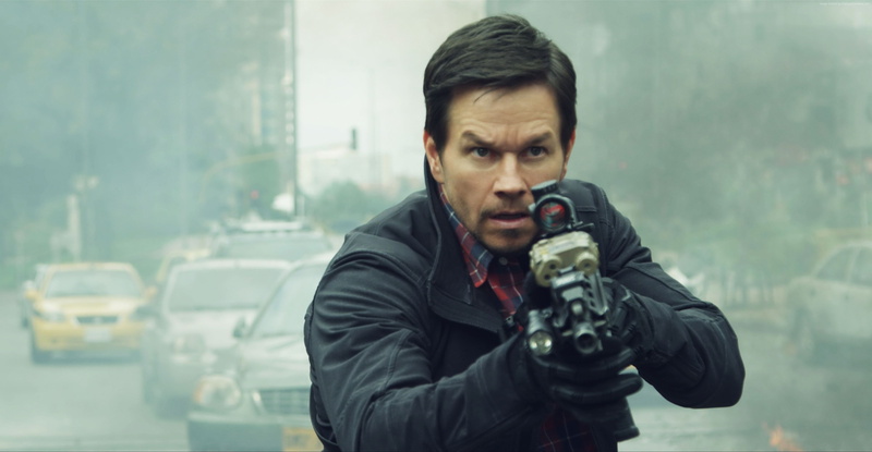 day, camera - photographic equipment, holding, Mile 22, uniform, Mark Wahlberg, adult, clothing, front view, waist up, technology, young adult, one person