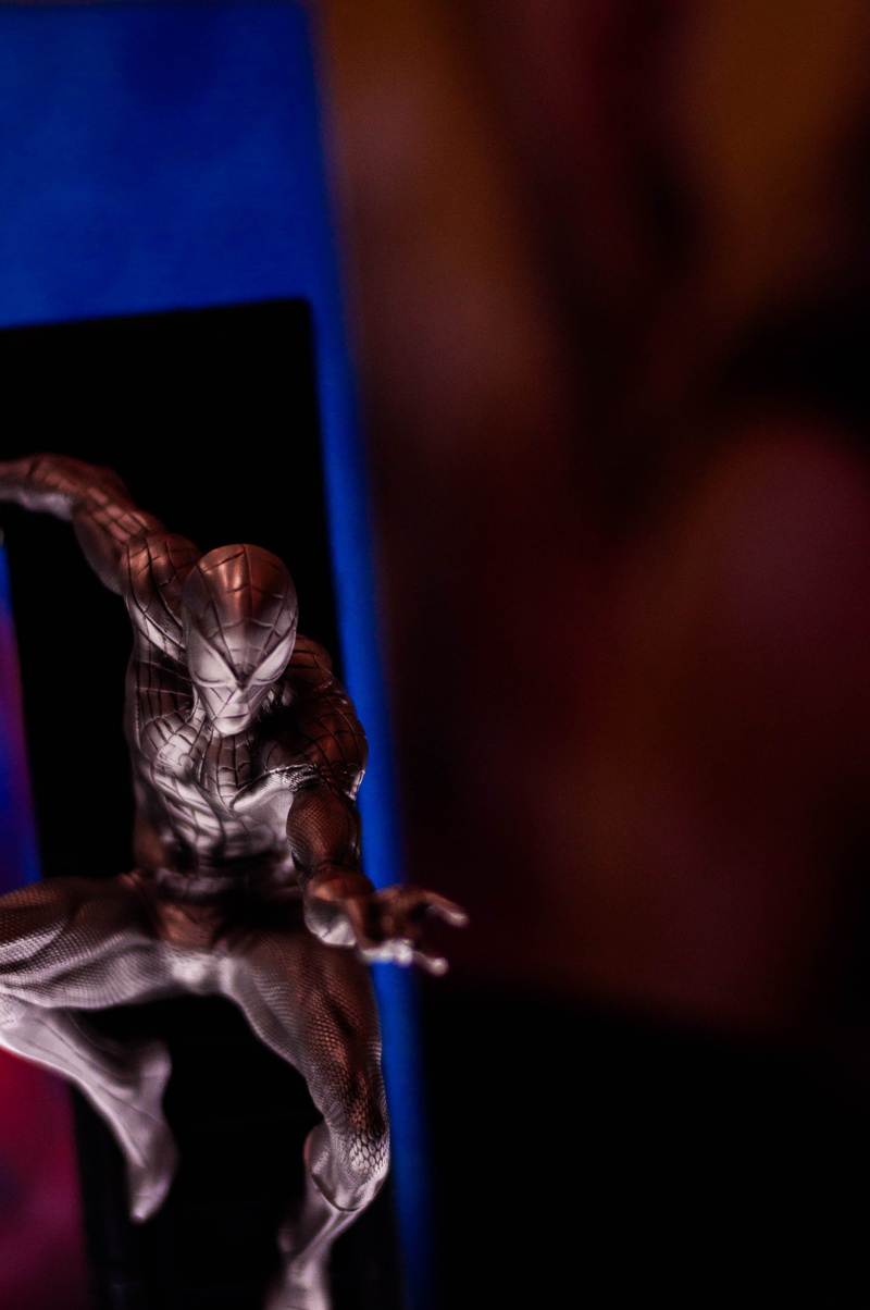 arachnid, dance pose, coat, animal body part, marvel, clothing, insect, acrobatic, side view, figure, adventure, close-up, overcoat, suit, arthropod, animal wildlife