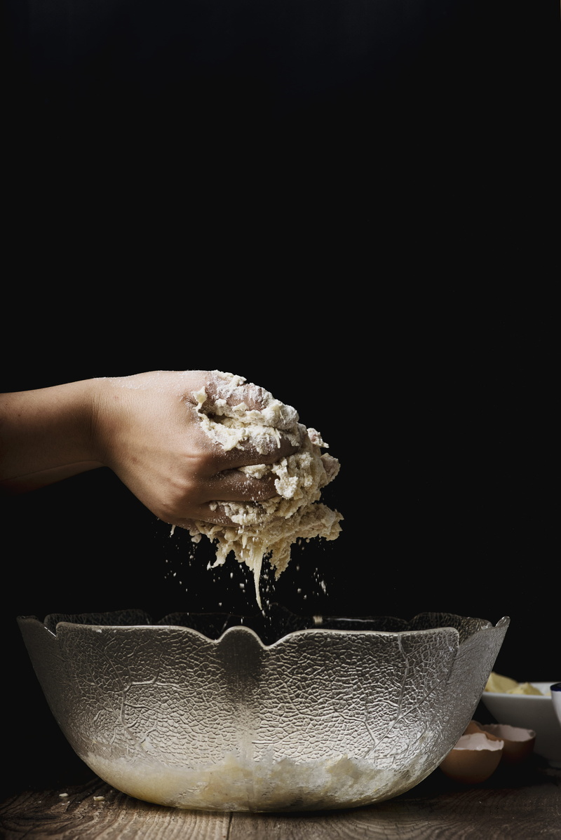 black Background, bowl, dough, close-up, indoors, copy space, wellbeing, brown, food, bake, hand, studio shot, room, clear, real people, pastries, finger