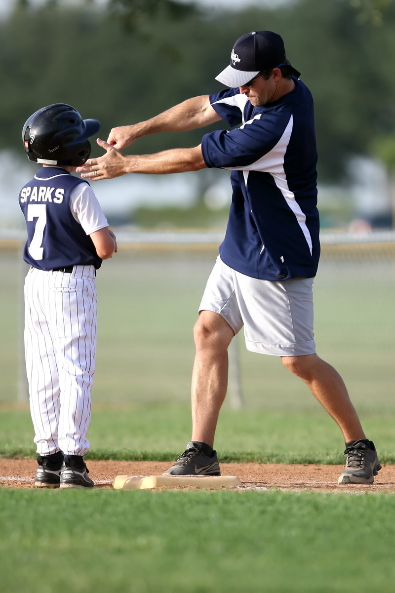 athlete, outdoors, man, bat, field, teaching, player, lifestyles, people, child, uniform, day, rear view, game, baseball coach, playing, coach, youth, males
