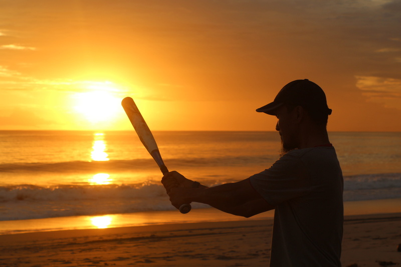 orange color, one person, sea, water, dusk, real people, land, beauty in nature, 5K, sunset, sun, beach, scenics - nature, holding, sky, leisure activity