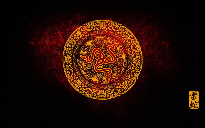  indoors, logo, YEAR OF THE SNAKE, still life, belief, black background, pattern, history, art and craft, cny, no people, religion, ornate, Razer