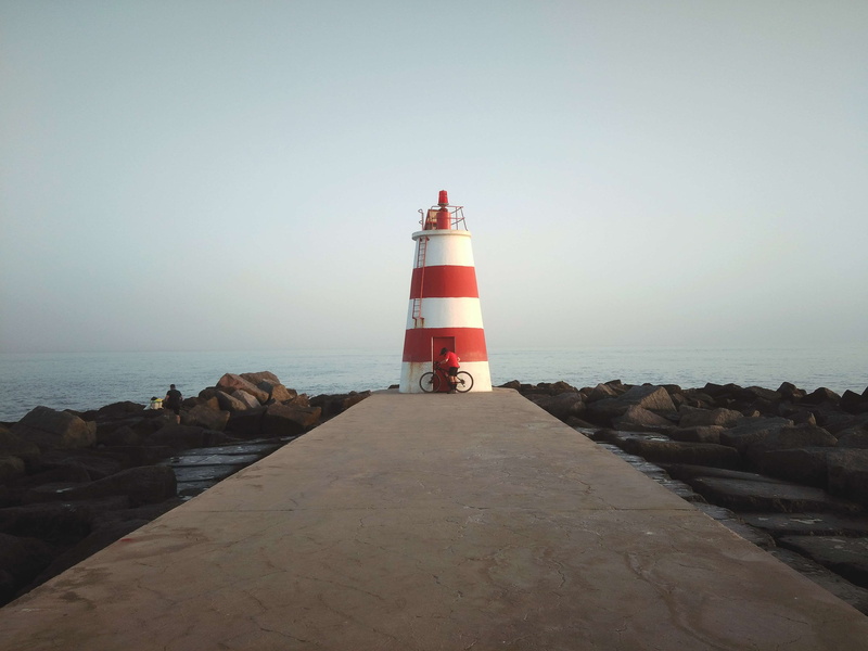 outdoors, groyne, architecture, direction, tower, horizon, clear sky, water, safety, protection, horizon over water, scenics - nature, no people, lighthouse