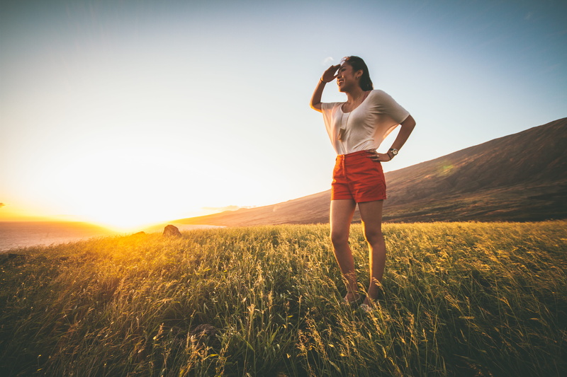 lifestyles, women, shorts, standing, outdoors, hairstyle, nature, batwing, non-urban scene, full length, sleeved, leisure activity, sunlight, woman, beauty in nature