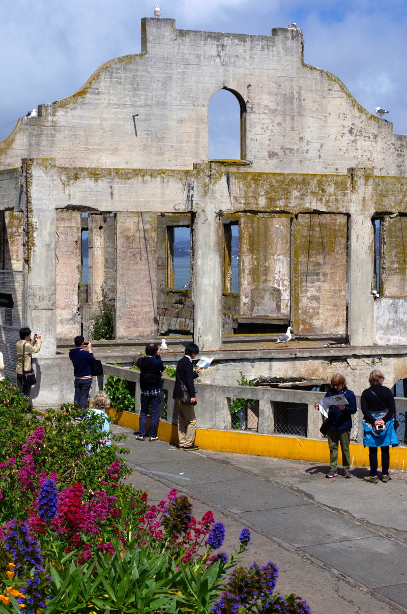 security, historic, the past, ancient, lighthouse, real people, prisoner, pier, tourist, people, alcatraz, island, history, adult, women, building exterior