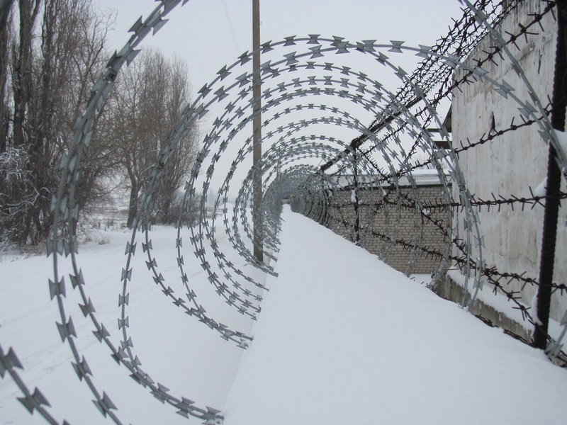 no people, water, winter, snow, covering, sky, jail, prison, architecture, built structure, defense, war, crime, bridge, army, forbidden, dangerous, trespass