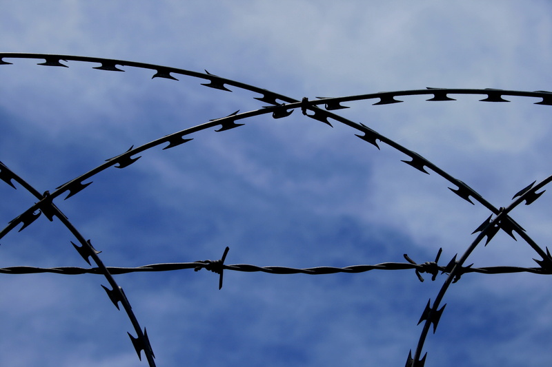 outdoors, razor, protection, boundary, prison, sign, warning sign, no people, metal, fence, sharp, sky, barrier, obstacle, barbed Wire, security, focus on foreground