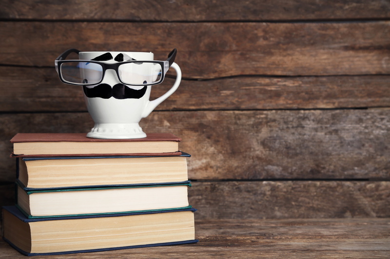 book, large group of objects, still life, wall - building feature, wood - material, education, cute, coffee, glasses, indoors, framed, funny, mug, hardcover book