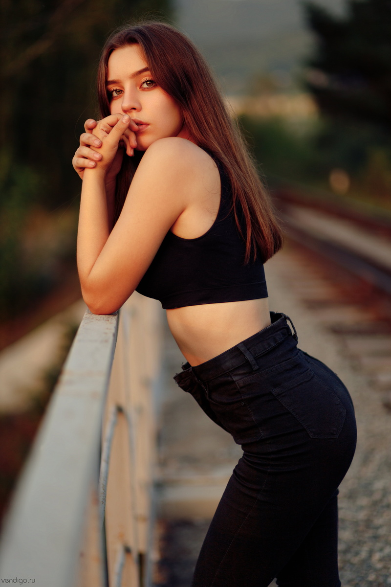women outdoors, outdoors, looking at viewer, side view, portrait display, vertical, women, model, black tops, 5K, Evgeniy Bulatov, depth of field, brunette