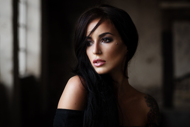 young women, contemplation, depression - sadness, focus on foreground, portrait, looking away, beautiful woman, black hair, one person, headshot, hairstyle