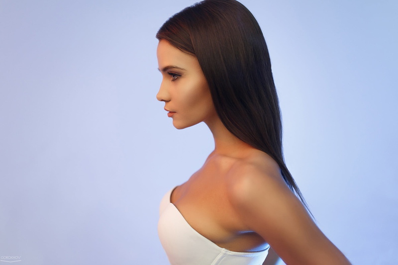 looking, profile view, Christina Makarova, standing, hair, blue background, side view, one person, photographer, simple background, headshot, copy space