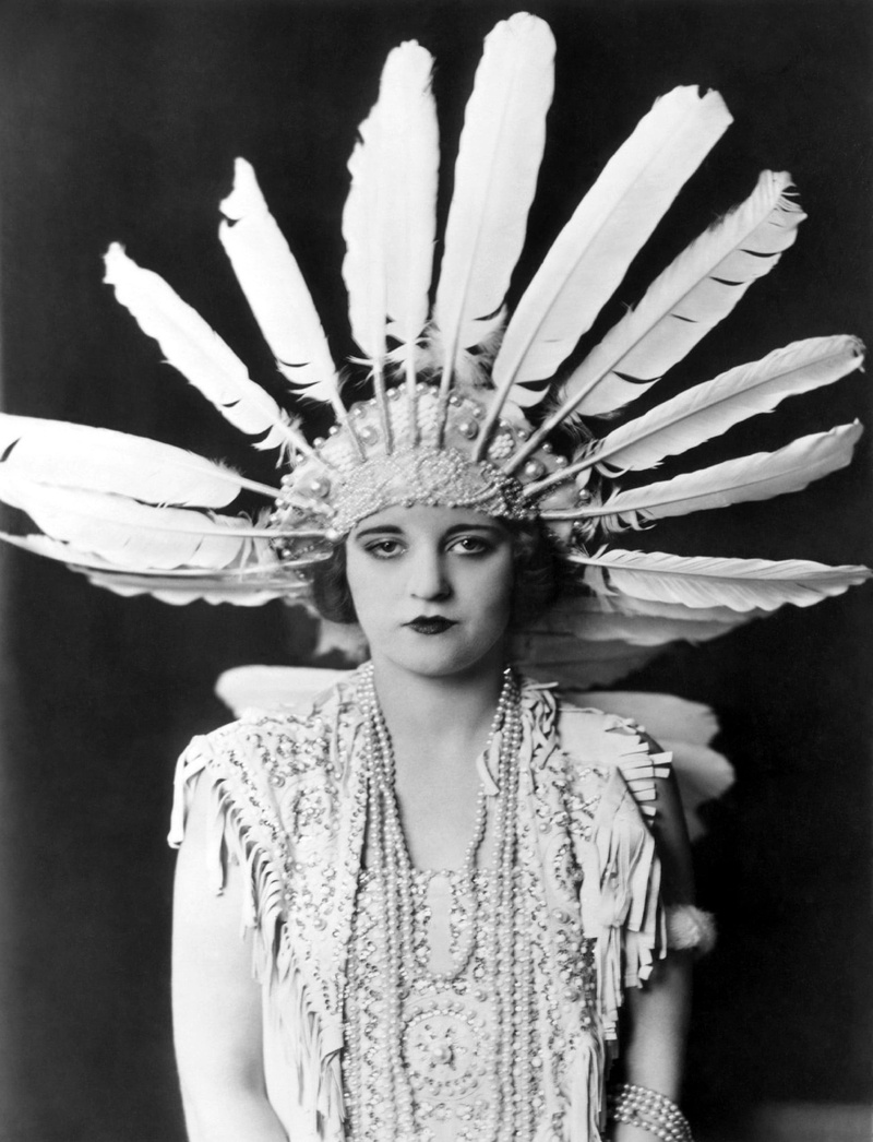 standing, women, females, broadway, performer, indoors, young women, leisure activity, front view, visual Art, headwear, studio shot, one person, portrait