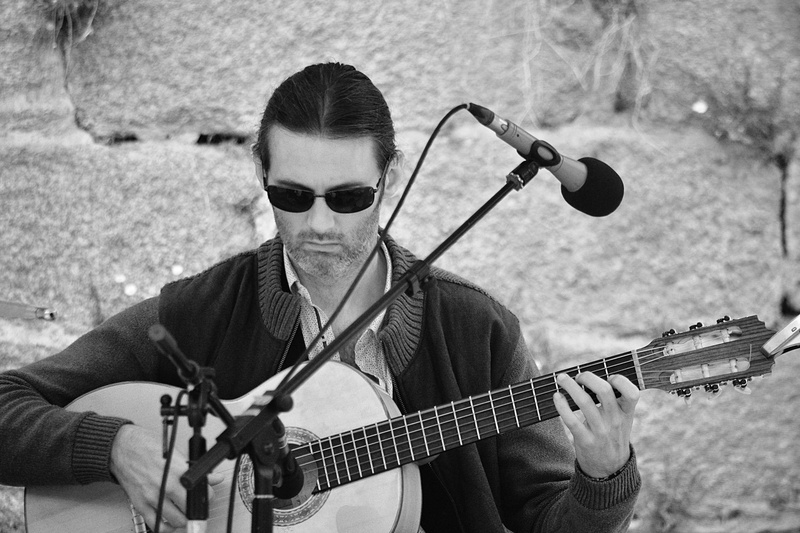 music, fashion, person, front view, singer, guitarist, grayscale, sunglasses, leisure activity, black-and-white, guitar, young men, glasses, playing, stringed instrument