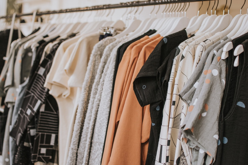 rail, lot, no people, hanged, clothing store, retail display, textile, order, assorted, large group of objects, fashion, collection, clothing, rack, in a row
