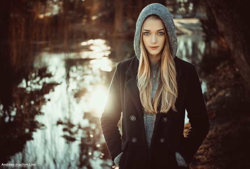 focus on foreground, beauty, warm clothing, looking at camera, standing, lifestyles, young women, outdoors, portrait, clothing, women, coats, winter, hoods