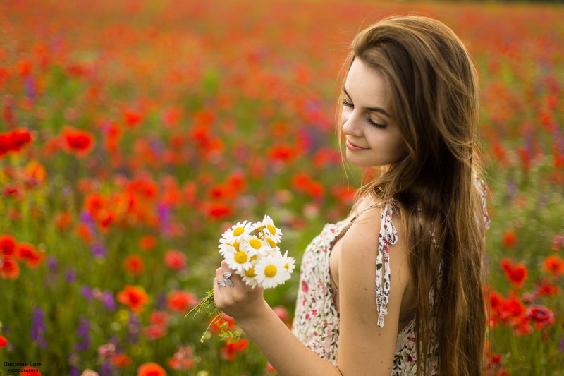 field, flowers, plant, sleeveless dress, beauty in nature, contemplation, fashion, beauty, adult, long hair, outdoors, smiling, women, depth of field, young women