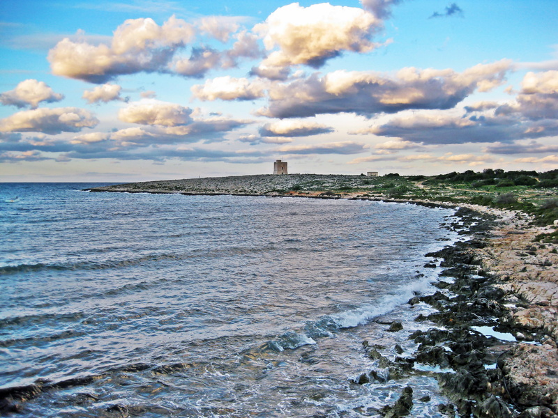 waterfront, ocean, scenics - nature, coast, building, lighthouse, guidance, landscape, day, castle, tower, shore, bay, rock, beauty in nature, clouds, water
