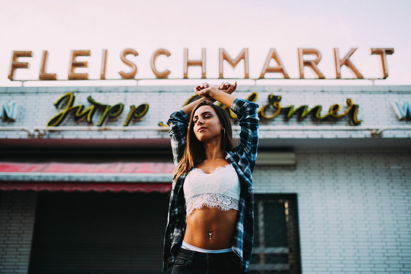 young women, women, pierced navel, beauty, closed eyes, young adult, adult, piercing, communication, outdoors, street, open shirt, text, one person, beautiful woman