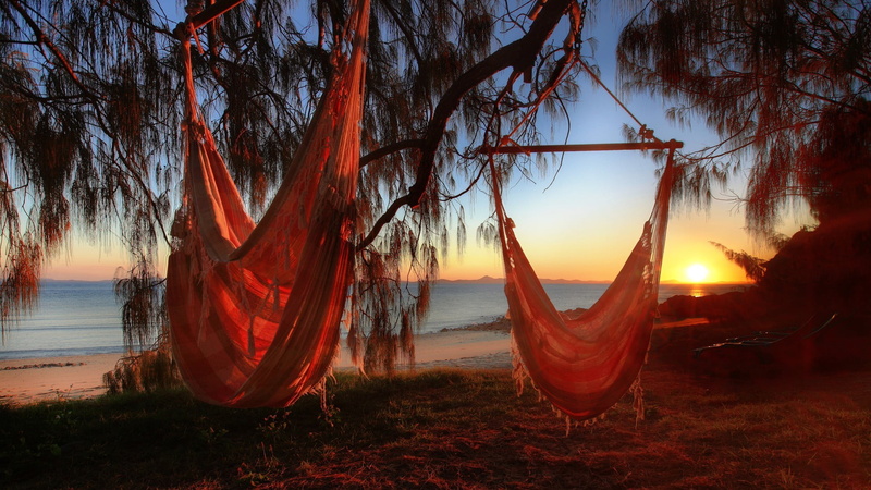 idyllic, relaxing, beauty in nature, no people, tranquility, sea, brown, land, sunset, outdoors, sun, sunlight, nature, sky, environment, scenics - nature