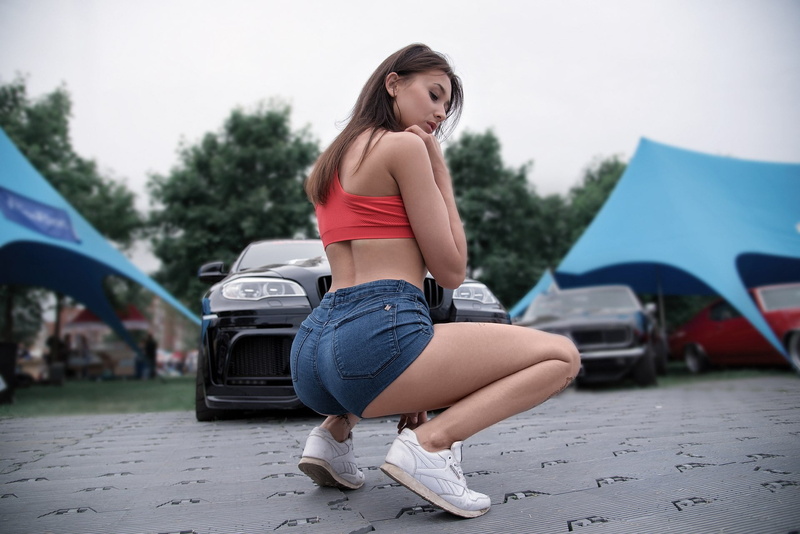 one Person, sensuality, car, summer, tanned, ass, road, land Vehicle, fashion Model, day, lifestyles, beauty, shorts, females, young Adult, focus on foreground