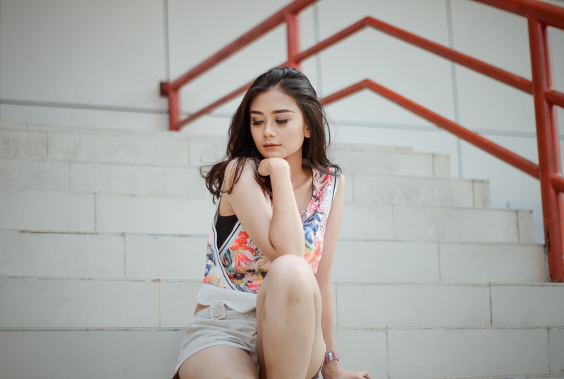 women, hairstyle, young, wall - building feature, three quarter length, young women, sitting, architecture, beautiful woman, wearing, tank, one person