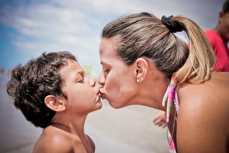 hair, woman, family photo, females, togetherness, kisses, parents, kissing, mother, positive emotion, boy, couple - relationship, vacations, happiness