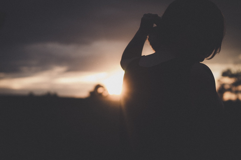 person, left, raising, sky, sunlight, portrait, dark, depression - sadness, wearing, rear view, real people, emotion, nature, women, tank, adult, outdoors