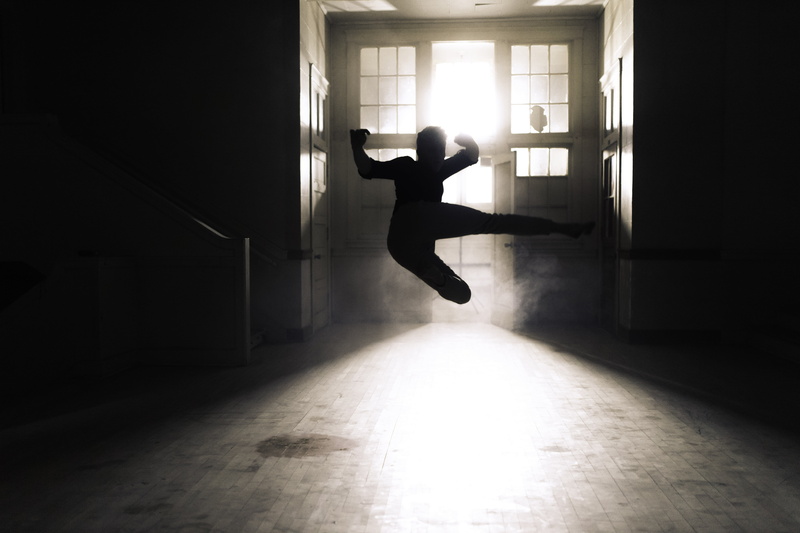 lifestyles, exercising, dancing, arms raised, action, street, window, backlit, full length, motion, only women, wooden floor, windows, side view, mid-air