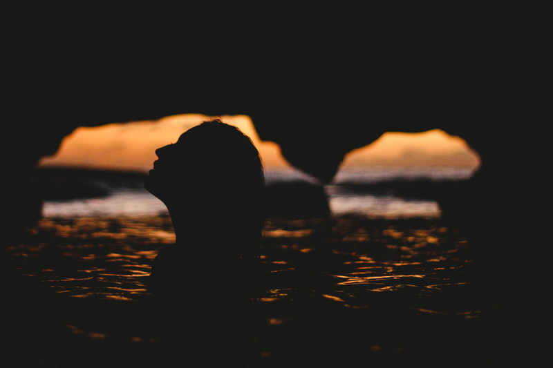 beach, land, inside, summer, fire, women, adult, water, photo, full length, burning, sunset, woman, rear view, people, cave, one woman only, standing, person