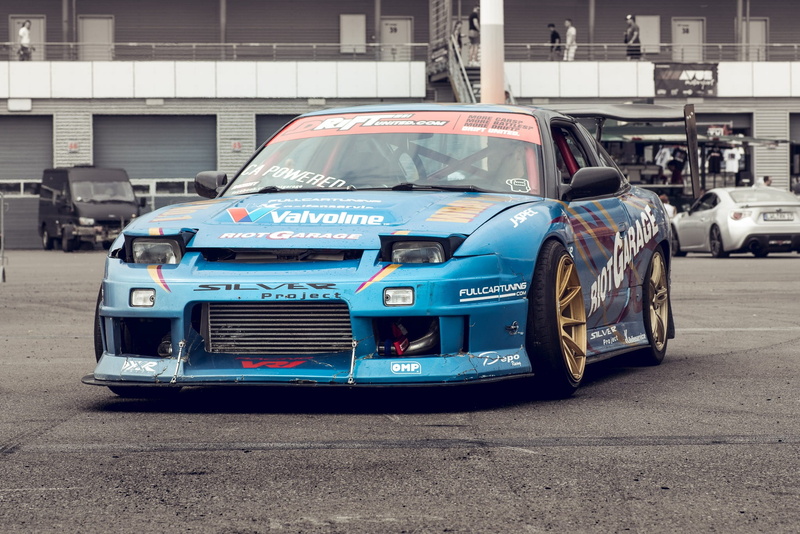 force, hood, race car driver, built structure, automotive, architecture, roadway, text, blue, race track, Auto, land vehicle, 1080P, race, stationary