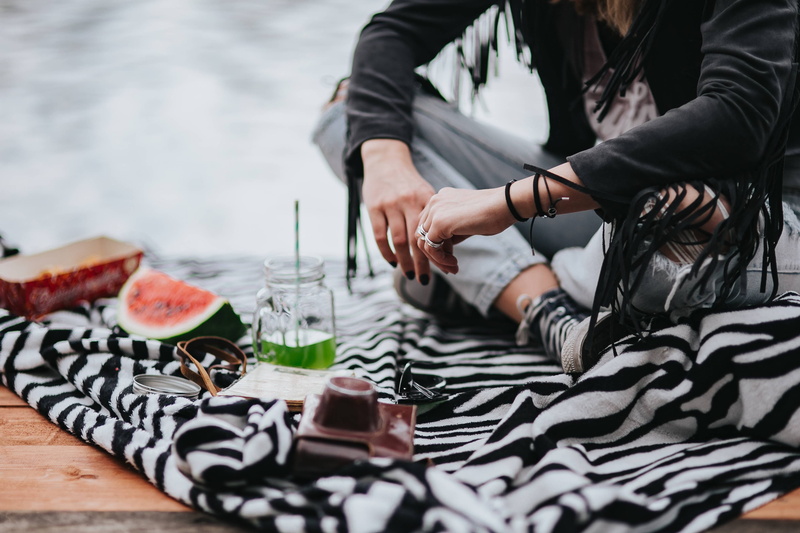 food and drink, sitting, sneakers, real people, casual clothing, relaxation, day, girl, Blonde, ripped, adult, converse, jetty, outdoors, two people, midsection