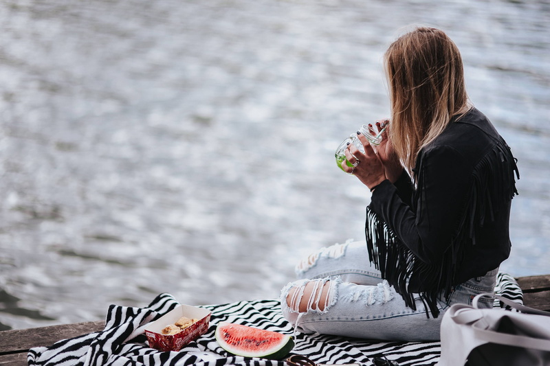 pier, lifestyles, nature, one woman only, woman, day, eating, lake, jacket, pretty, converse, casual clothing, female, sea, people, only women, sneakers