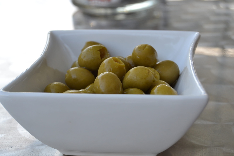 no people, shiny, large group of objects, wellbeing, olive, Oil, fruit, Olives, food, abundance, freshness, indoors, table, close-up, stuffed olives, focus on foreground