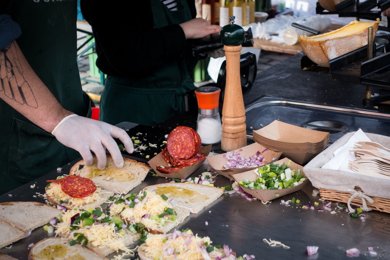 preparation, sandwich, holding, hand, vegetable, cooking, domestic room, healthy eating, salami, kitchen, food, pizza, preparing food, human hand, food and drink