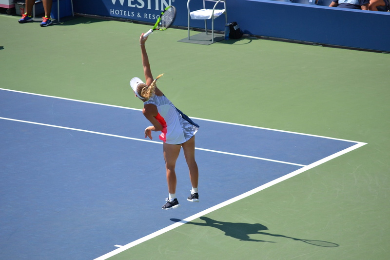 outdoors, shadow, net, lifestyles, racquet, sunlight, training, arms raised, sport, ball, taking a shot - sport, return, woman, tennis, tennis ball, racket