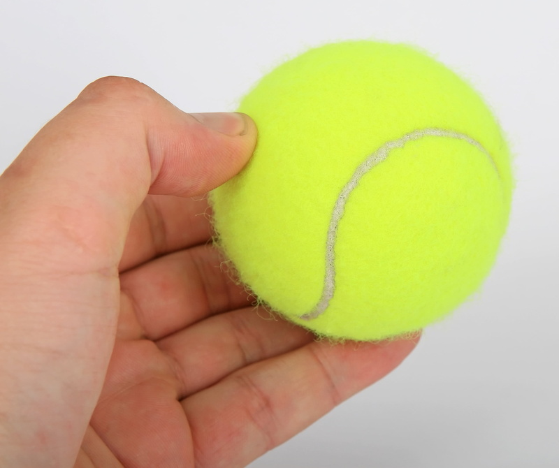 white, match, human hand, smash, detail, yellow, human finger, sphere, close, studio shot, body part, set, background, unrecognizable person, isolated