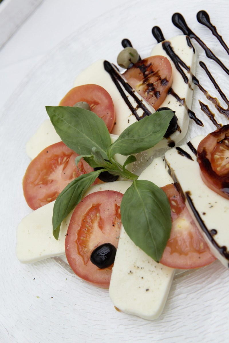 benefit from, cut, tomatoes, edible, vegetarian, no people, mozarella, pizza, ready-to-eat, wellbeing, meal, crockery, balsamic vinegar, herb, vegetables