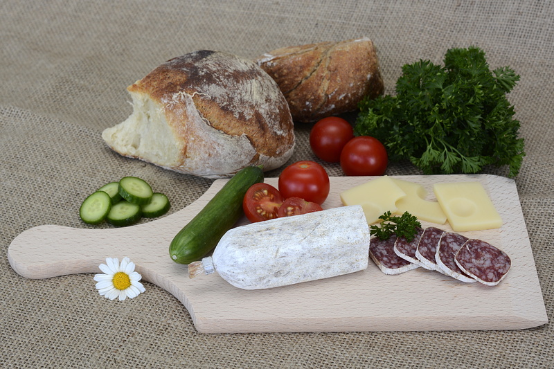 studio shot, indoors, freshness, bread, wooden, the bündner speciality, no people, hossein, raw sausage, parsley, roll, peel, meal, still life, emmental cheese